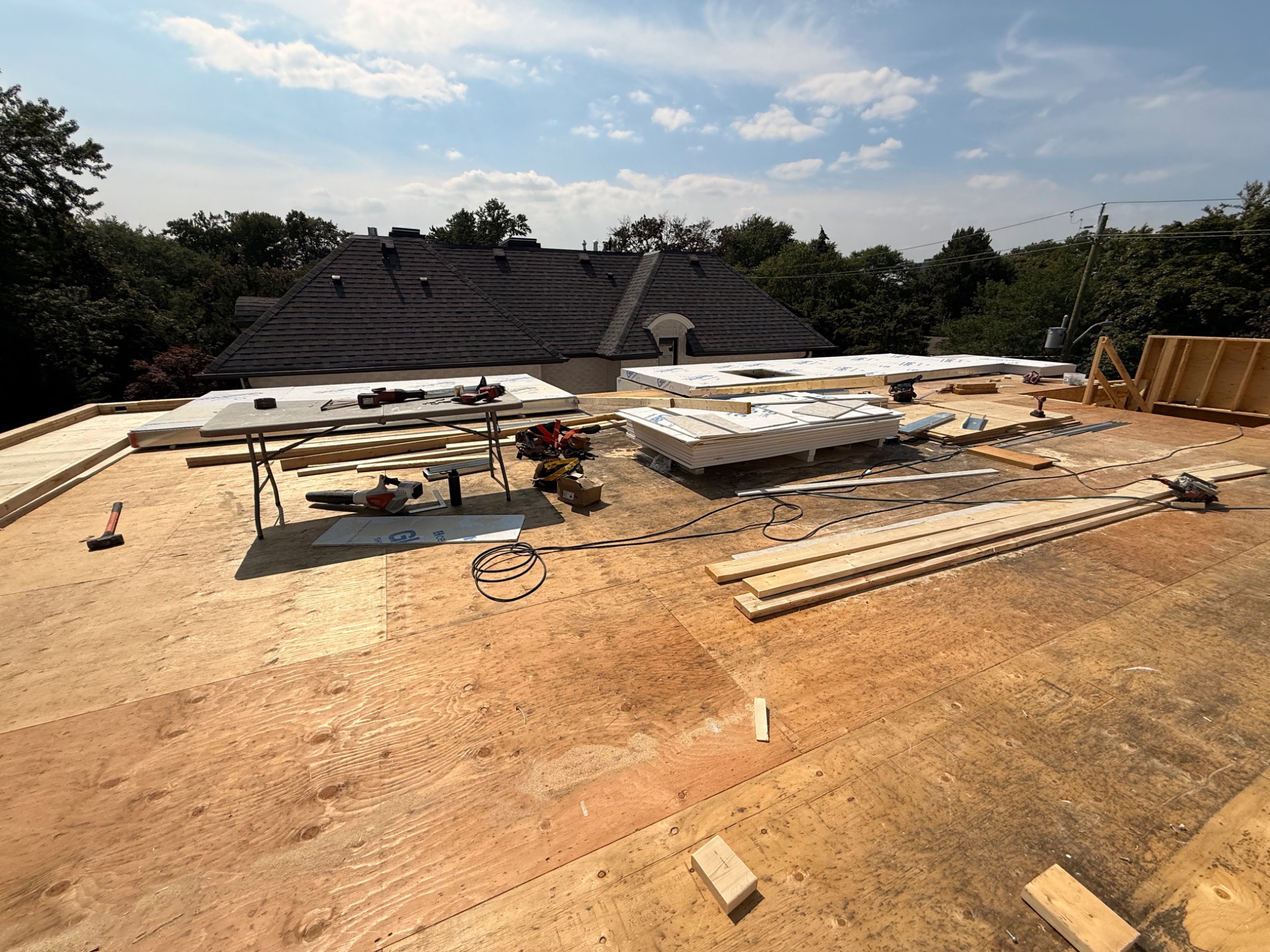 Penthouse-level floor deck and materials on July 20