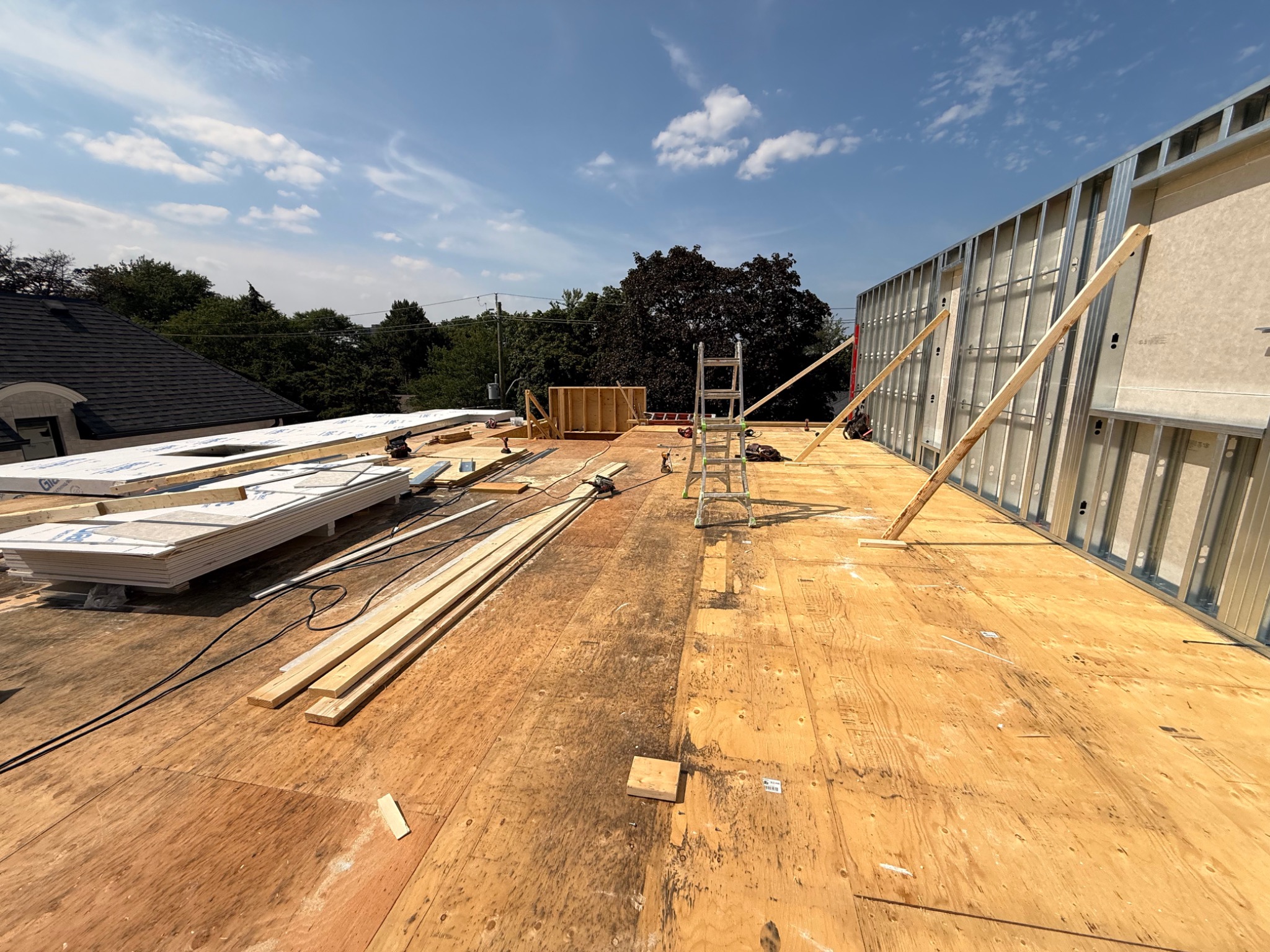 Penthouse-level exterior wall framing progress on July 20