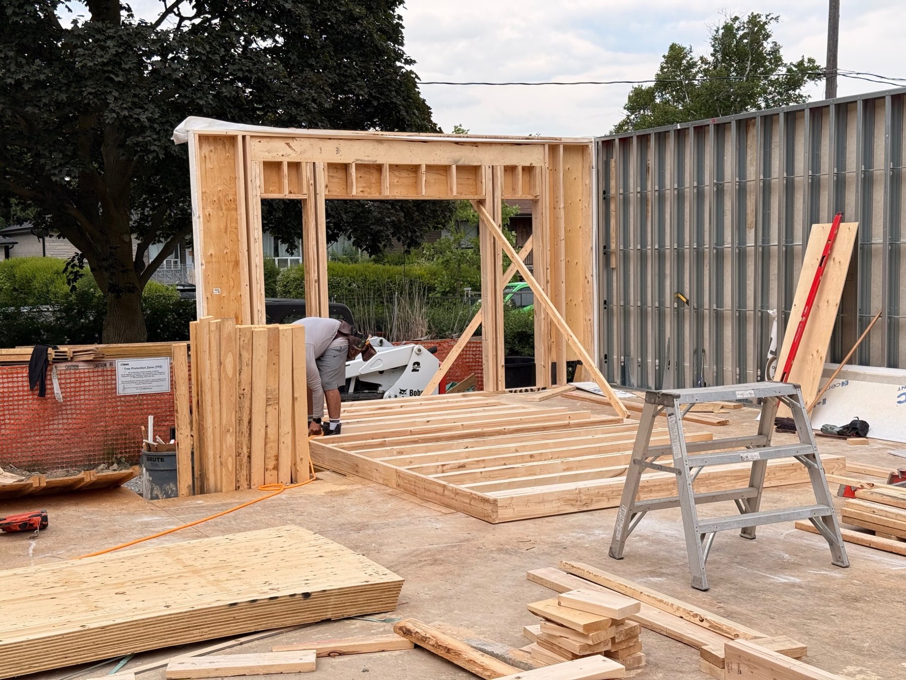 Main-floor framing progress on June 17