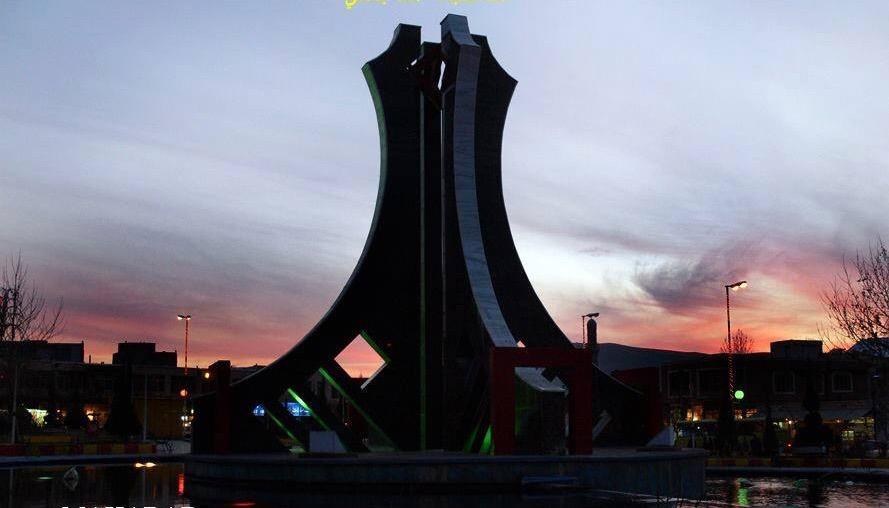 Urban square monument at dusk